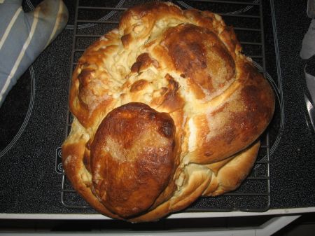 A funny looking apple challah.
